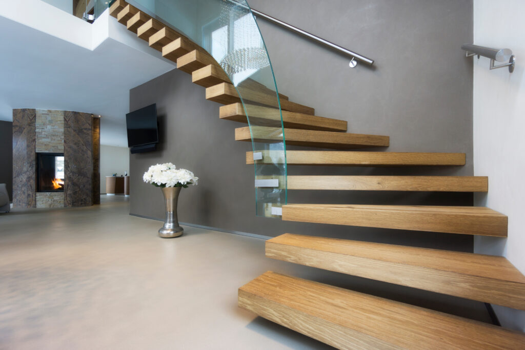 Wooden staircase with glass sides in Liverpool home